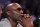Former Los Angeles Lakers' Lamar Odom watches during the second half of an NBA basketball game between the Lakers and the Miami Heat, Wednesday, March 30, 2016, in Los Angeles. The Lakers won 102-100 in overtime. (AP Photo/Mark J. Terrill)
