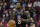 Los Angeles Clippers' Patrick Beverley (21) brings the ball up the court against the Houston Rockets during the first half of an NBA basketball game Wednesday, Nov. 13, 2019, in Houston. (AP Photo/David J. Phillip)