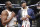 Miami Heat guard Dwyane Wade, left, chats with former NBA player Carmelo Anthony, after giving Anthony his game jersey following an NBA basketball game between the Heat and the Brooklyn Nets on Wednesday, April 10, 2019, in New York. It was the last game of Wade's NBA career. (AP Photo/Kathy Willens)
