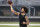 Free agent Colin Kaepernick participates in a workout for NFL football scouts and media Saturday, Nov. 16, 2019 in Riverdale, Ga. (AP Photo/Todd Kirkland)