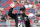 Jimmie Johnson waves during driver introductions prior to the NASCAR Cup Series auto race at ISM Raceway, Sunday, Nov. 10, 2019, in Avondale, Ariz. (AP Photo/Ralph Freso)