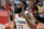 Houston Rockets guard James Harden (13) reacts after scoring a 3-point shot against the Atlanta Hawks during the first half of an NBA basketball game, Saturday, Nov. 30, 2019, in Houston. (AP Photo/Michael Wyke)