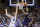 Stephen F. Austin forward Nathan Bain (23) drives for a game winning basket over Duke forward Jack White (41) during overtime in an NCAA college basketball game in Durham, N.C., Tuesday, Nov. 26, 2019. Stephen F. Austin won 85-83. (AP Photo/Gerry Broome)