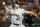 FILE - In this Oct. 27, 2019, file photo, Houston Astros starting pitcher Gerrit Cole throws against the Washington Nationals during the first inning of Game 5 of the baseball World Series in Washington. Gerrit Cole, the top pitcher on the free-agent market, was to meet with New York Yankees officials in California on Tuesday, Dec. 3, 2019. General manager Brian Cashman, manager Aaron Boone and new Yankees pitching coach Matt Blake made the trip to speak with the 29-year-old right-hander, a person familiar with the planning said. The person spoke to The Associated Press on condition of anonymity because the meeting was not announced.(AP Photo/Patrick Semansky, File)