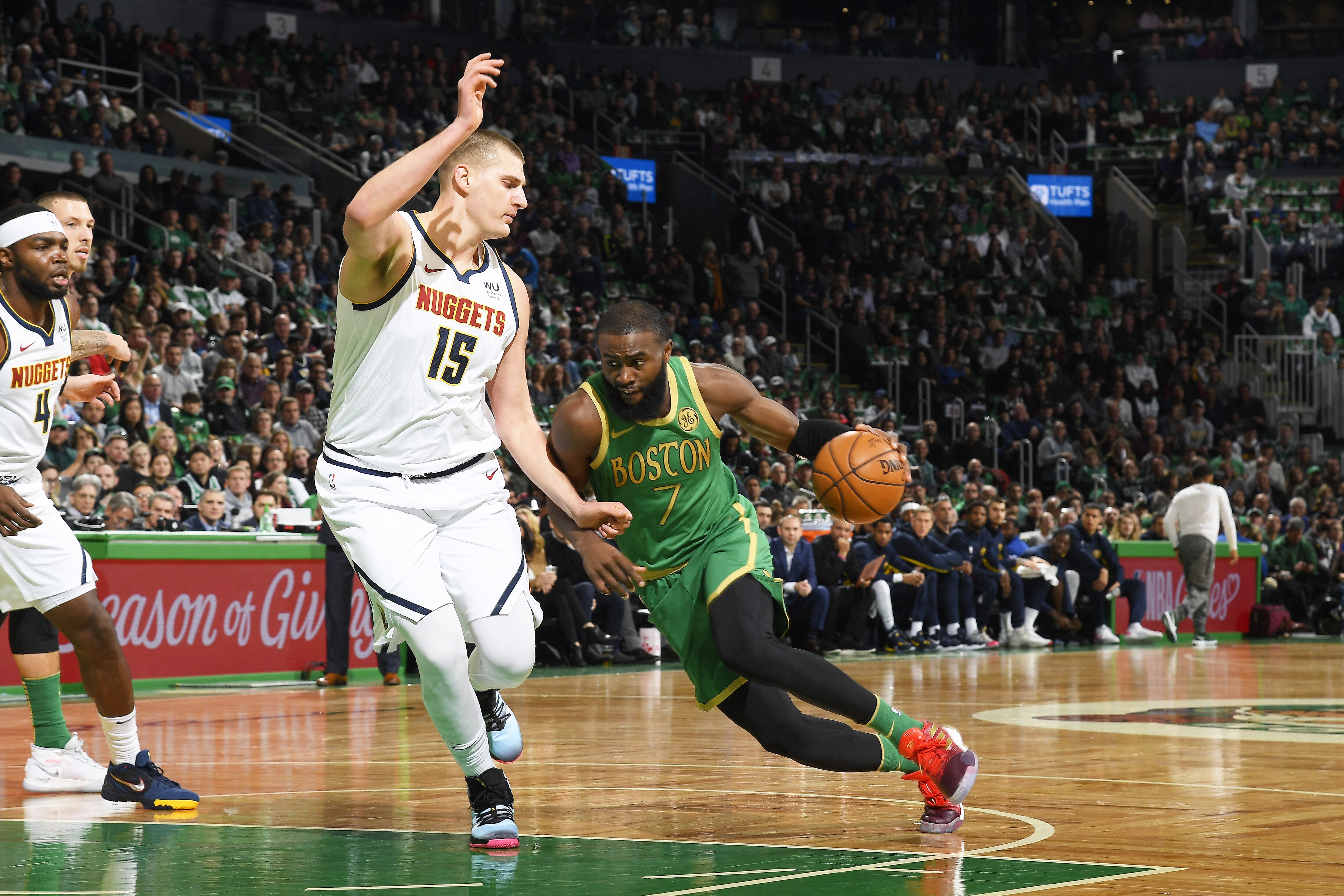 BOSTON, MA - DECEMBER 6: Jaylen Brown #7 of the Boston Celtics handles the ball against the Denver Nuggets on December 6, 2019 at the TD Garden in Boston, Massachusetts. NOTE TO USER: User expressly acknowledges and agrees that, by downloading and or using this photograph, User is consenting to the terms and conditions of the Getty Images License Agreement. Mandatory Copyright Notice: Copyright 2019 NBAE (Photo by Brian Babineau/NBAE via Getty Images)