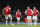 Players of Arsenal stand in the circle after Brighton's Neal Maupay scored his sides second goal during their English Premier League soccer match between Arsenal and Brighton, at the Emirates Stadium in London, Thursday, Dec. 5, 2019. (AP Photo/Frank Augstein)