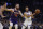 Golden State Warriors' Stephen Curry, right, passes the ball away from Phoenix Suns' Aron Baynes (46) during the first half of an NBA basketball game Wednesday, Oct. 30, 2019, in San Francisco. (AP Photo/Ben Margot)