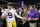 LSU quarterback Joe Burrow and LSU head coach Ed Orgeron celebrate after the Southeastern Conference championship NCAA college football game against Georgia, Saturday, Dec. 7, 2019, in Atlanta. LSU won 37-10. (AP Photo/John Bazemore)