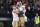 San Francisco 49ers quarterback Jimmy Garoppolo, right, celebrates his touchdown pass with offensive tackle Mike McGlinchey in the first half an NFL football game in New Orleans, Sunday, Dec. 8, 2019. (AP Photo/Butch Dill)