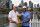 TOPSHOT - International team captain Ernie Els of South Africa (L) and Tiger Woods, captain of the US team (R) hold the Presidents Cup trophy in Melbourne on December 9, 2019. - The Presidents Cup is to be played at the Royal Melbourne Colf Club from December 12-15. (Photo by William WEST / AFP) / -- IMAGE RESTRICTED TO EDITORIAL USE - STRICTLY NO COMMERCIAL USE -- (Photo by WILLIAM WEST/AFP via Getty Images)