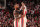 PORTLAND, OR - NOVEMBER 27: Damian Lillard #0 and Carmelo Anthony #00 of the Portland Trail Blazers hug during the game against the Oklahoma City Thunder on November 27, 2019 at the Moda Center Arena in Portland, Oregon. NOTE TO USER: User expressly acknowledges and agrees that, by downloading and or using this photograph, user is consenting to the terms and conditions of the Getty Images License Agreement. Mandatory Copyright Notice: Copyright 2019 NBAE (Photo by Cameron Browne/NBAE via Getty Images)