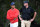 US team captain Tiger Woods (L) and International team player Marc Leishman of Australia looks on during day one of the Presidents Cup golf tournament in Melbourne on December 12, 2019. (Photo by William WEST / AFP) / -- IMAGE RESTRICTED TO EDITORIAL USE - STRICTLY NO COMMERCIAL USE -- (Photo by WILLIAM WEST/AFP via Getty Images)
