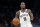 Brooklyn Nets' Iman Shumpert plays against the Boston Celtics during an NBA basketball game in Boston, Wednesday, Nov. 27, 2019. (AP Photo/Michael Dwyer)