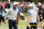 MELBOURNE, AUSTRALIA - DECEMBER 13: Playing Captain Tiger Woods of the United States team and Justin Thomas of the United States team celebrate defeating Byeong-Hun An of South Korea and the International team and Hideki Matsuyama of Japan and the International team 1up on the 18th green during Friday foursome matches on day two of the 2019 Presidents Cup at Royal Melbourne Golf Course on December 13, 2019 in Melbourne, Australia. (Photo by Rob Carr/Getty Images)