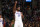 BOSTON, MA - DECEMBER 12: Joel Embiid #21 of the Philadelphia 76ers reacts to play against the Boston Celtics on December 12, 2019 at the TD Garden in Boston, Massachusetts.  NOTE TO USER: User expressly acknowledges and agrees that, by downloading and or using this photograph, User is consenting to the terms and conditions of the Getty Images License Agreement. Mandatory Copyright Notice: Copyright 2019 NBAE  (Photo by Brian Babineau/NBAE via Getty Images)