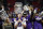 LSU quarterback Joe Burrow (9) celebrate with teammates after the Southeastern Conference championship NCAA college football game against Georgia, Saturday, Dec. 7, 2019, in Atlanta. LSU won 37-10. (AP Photo/John Bazemore)