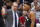 Toronto Raptors head coach Nick Nurse, left, listens to Kyle Lowry during the first half of an NBA basketball game against the Chicago Bulls Monday, Dec. 9, 2019, in Chicago. (AP Photo/Charles Rex Arbogast)