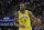 Golden State Warriors guard Andre Iguodala (9) against the Denver Nuggets during an NBA basketball game in Oakland, Calif., Tuesday, April 2, 2019. (AP Photo/Jeff Chiu)