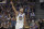 Golden State Warriors guard Stephen Curry gestures after making a 3-point basket against the Los Angeles Lakers during the first half of a preseason NBA basketball game in San Francisco, Saturday, Oct. 5, 2019. (AP Photo/Jeff Chiu)