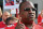 COLUMBUS, OH - AUGUST 6:  Stacy Elliott, father of former Ohio State Buckeyes running back Ezekiel Elliott, speaks at a rally in support of Ohio State head football coach Urban Meyer at Ohio State University on August 6, 2018 in Columbus, Ohio. Meyer is on paid administrative leave after a reports alleging he knew of a 2015 allegation of domestic violence against former assistant football coach Zach Smith, who was fired in July.  (Photo by Jamie Sabau/Getty Images)