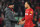 Liverpool's German manager Jurgen Klopp (L) talks with Liverpool's Dutch defender Virgil van Dijk following the English Premier League football match between Liverpool and Brighton and Hove Albion at Anfield in Liverpool, north west England on December 1, 2019. (Photo by Paul ELLIS / AFP) / RESTRICTED TO EDITORIAL USE. No use with unauthorized audio, video, data, fixture lists, club/league logos or 'live' services. Online in-match use limited to 120 images. An additional 40 images may be used in extra time. No video emulation. Social media in-match use limited to 120 images. An additional 40 images may be used in extra time. No use in betting publications, games or single club/league/player publications. /  (Photo by PAUL ELLIS/AFP via Getty Images)