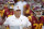 Southern California head coach Clay Helton enters the field with this team before an NCAA college football game against Utah Friday, Sept. 20, 2019, in Los Angeles. (AP Photo/Marcio Jose Sanchez)