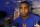 New York Mets' Yoenis Cespedes holds a news conference before a baseball game between the Mets and the Miami Marlins, Sunday, Sept. 30, 2018, in New York. (AP Photo/Jason DeCrow)