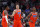 Oklahoma City Thunder forward Danilo Gallinari (8) celebrates a three-point basket with guards Shai Gilgeous-Alexander and Chris Paul (3) in the second half of an NBA basketball game against the New Orleans Pelicans in New Orleans, Sunday, Dec. 1, 2019. (AP Photo/Gerald Herbert)
