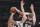 Los Angeles Lakers forward Anthony Davis is fouled as he shoots between Denver Nuggets forward Michael Porter Jr., left, and center Mason Plumlee during the first half of an NBA basketball game Sunday, Dec. 22, 2019, in Los Angeles. (AP Photo/Michael Owen Baker)