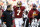 Washington Redskins quarterback Dwayne Haskins walks with trainers to a cart while being taken off the field after being sacked by New York Giants linebacker Lorenzo Carter during the second half of an NFL football game, Sunday, Dec. 22, 2019, in Landover, Md. (AP Photo/Patrick Semansky)