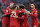 Liverpool's Egyptian midfielder Mohamed Salah celebrates with teammates after scoring his team's first goal during the English Premier League football match between Liverpool and Watford at Anfield in Liverpool, north west England on December 14, 2019. (Photo by Paul ELLIS / AFP) / RESTRICTED TO EDITORIAL USE. No use with unauthorized audio, video, data, fixture lists, club/league logos or 'live' services. Online in-match use limited to 120 images. An additional 40 images may be used in extra time. No video emulation. Social media in-match use limited to 120 images. An additional 40 images may be used in extra time. No use in betting publications, games or single club/league/player publications. /  (Photo by PAUL ELLIS/AFP via Getty Images)