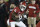 Oklahoma wide receiver CeeDee Lamb (2) carries during an NCAA college football game between Iowa State and Oklahoma in Norman, Okla., Saturday, Nov. 9, 2019. (AP Photo/Sue Ogrocki)