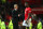 MANCHESTER, ENGLAND - SEPTEMBER 25:  Ole Gunnar Solskjaer the head coach / manager of Manchester United speaks to Paul Pogba of Manchester United before the penalty shoot out during the Carabao Cup Third Round match between Manchester United and Rochdale AFC at Old Trafford on September 25, 2019 in Manchester, England. (Photo by Robbie Jay Barratt - AMA/Getty Images)