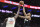 PHILADELPHIA, PENNSYLVANIA - DECEMBER 25: Giannis Antetokounmpo #34 of the Milwaukee Bucks attempts a basket as Joel Embiid #21 of the Philadelphia 76ers defends during the first half of the game at Wells Fargo Center on December 25, 2019 in Philadelphia, Pennsylvania. NOTE TO USER: User expressly acknowledges and agrees that, by downloading and or using this photograph, User is consenting to the terms and conditions of the Getty Images License Agreement. (Photo by Sarah Stier/Getty Images)