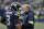 Seattle Seahawks head coach Pete Carroll, right, talks with quarterback Russell Wilson, left, during the first half of an NFL football game against the Arizona Cardinals, Sunday, Dec. 22, 2019, in Seattle. (AP Photo/Elaine Thompson)