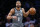 Brooklyn Nets guard Spencer Dinwiddie (8) dribbles the ball against the Atlanta Hawks during the second half of an NBA basketball game, Saturday, Dec. 21, 2019, in New York. (AP Photo/Noah K. Murray)