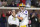 LSU quarterback Joe Burrow looks for a receiver during the first half of the team's NCAA college football game against Mississippi in Oxford, Miss., Saturday, Nov. 16, 2019. (AP Photo/Thomas Graning)