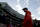 Boston Red Sox manager Alex Cora walks to the dugout after batting practice before Game 2 of a baseball American League Championship Series against the Houston Astros on Sunday, Oct. 14, 2018, in Boston. (AP Photo/Charles Krupa)