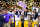 NEW ORLEANS, LOUISIANA - JANUARY 13: Joe Burrow of the LSU Tigers raises the National Championship Trophy with Ed Orgeron, Grant Delpit #7, Patrick Queen #8, and Rashard Lawrence #90 after the College Football Playoff National Championship game at the Mercedes Benz Superdome on January 13, 2020 in New Orleans, Louisiana. The LSU Tigers topped the Clemson Tigers, 42-25. (Photo by Alika Jenner/Getty Images)