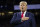 President Donald Trump stands for the national anthem before the beginning of the NCAA College Football Playoff National Championship game between LSU and Clemson, Monday, Jan. 13, 2020, in New Orleans. (AP Photo/ Evan Vucci)