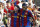 Barcelona's Argentinian Messi (L) is congratulated by his teammate Brazilian Ronaldinho (R) after scoring during the Liga football match Barcelona vs Athletico Madrid at the New Camp in Barcelona , 07 october 2007.  AFP PHOTO / PHILIPPE DESMAZES (Photo credit should read PHILIPPE DESMAZES/AFP via Getty Images)