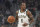 Milwaukee Bucks' Eric Bledsoe dribbles during the first half of an NBA basketball game against the Boston Celtics Thursday, Jan. 16, 2020, in Milwaukee. (AP Photo/Morry Gash)
