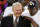 FILE - In this May 29, 2008 file photo, Los Angeles Lakers' Kobe Bryant gives basketball great Jerry West a shoulder rub after the Lakers beat the San Antonio Spurs in Game 5 of the NBA Western Conference basketball finals in Los Angeles. When asked about the latest honor in a long series of enshrinements and accolades since West hung up his sneakers in 1974, the longtime Los Angeles Lakers guard and executive seemed to be anticipating his trip to Kansas City to be inducted into the National Collegiate Basketball Hall of Fame with something between cautious excitement and outright dread. (AP Photo/Kevork Djansezian, File)
