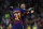 Barcelona's Ansu Fati is embraced by Barcelona's Lionel Messi after Fati scored his side's opening goal during a Spanish La Liga soccer match between Barcelona and Levante at the Camp Nou stadium in Barcelona, Spain, Sunday Feb. 2, 2020. (AP Photo/Joan Monfort)