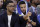 Golden State Warriors' Stephen Curry, right, gestures while speaking to teammate D'Angelo Russell on the bench as they watch during the second half of the team's NBA basketball game against the Milwaukee Bucks on Wednesday, Jan. 8, 2020, in San Francisco. (AP Photo/Ben Margot)
