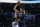 Orlando Magic forward Aaron Gordon, right, shoots over Charlotte Hornets forward Miles Bridges in the second half of an NBA basketball game in Charlotte, N.C., Monday, Feb. 3, 2020. Orlando won 112-100. (AP Photo/Nell Redmond)