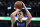 Dallas Mavericks forward Kristaps Porzingis (6) shoots during warmups before an NBA basketball game against the Los Angeles Lakers Friday, Jan. 10, 2020, in Dallas. (AP Photo/Richard W. Rodriguez)