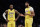 Los Angeles Lakers' LeBron James (23) talks to Anthony Davis (3) during the first half of an NBA basketball game against the Brooklyn Nets Thursday, Jan. 23, 2020, in New York. (AP Photo/Frank Franklin II)
