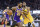 Los Angeles Lakers forward LeBron James (23) drives to the basket as Golden State Warriors guard Andrew Wiggins defends in the first half of an NBA basketball game in San Francisco Saturday, Feb. 8, 2020. (AP Photo/John Hefti)