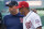 Boston Red Sox manager Alex Cora, left, and Washington Nationals manager Dave Martinez, right, speak together after posing for a photo together before a baseball game between the Boston Red Sox and the Washington Nationals at Nationals Park, Monday, July 2, 2018, in Washington. Both managers are of Puerto Rican decent. (AP Photo/Andrew Harnik)